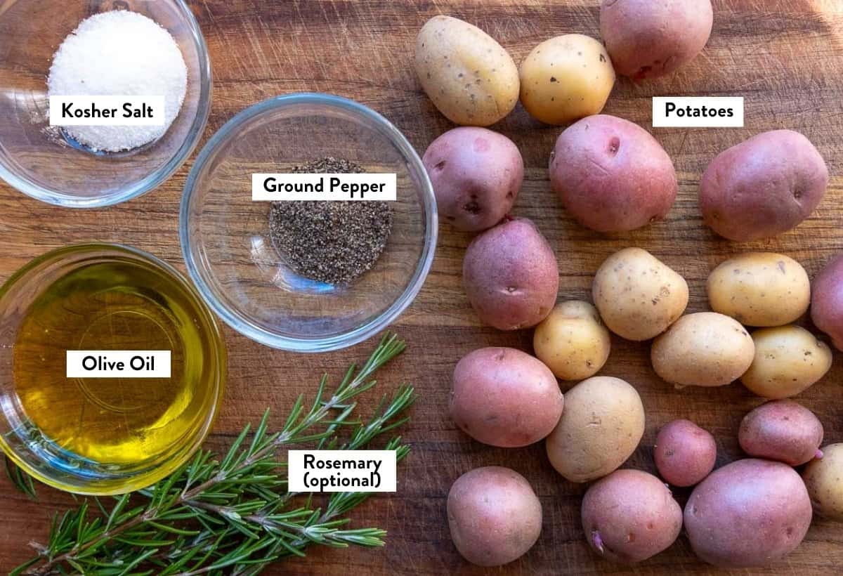 Ingredients for roasted potatoes on a cutting board overlayed with text descriptions of each ingredient.