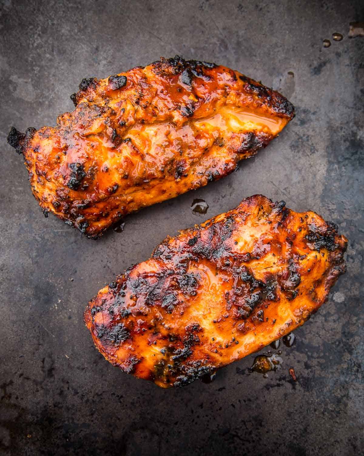 Chipotle Marinated Grilled Chicken Breasts resting on a platter