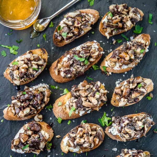 Grilled Mushroom Crostini with Honey and Balsamic on a serving platter