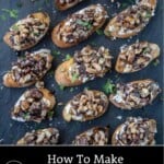 Mushroom Crostini with honey and balsamic drizzle on a slate plate.