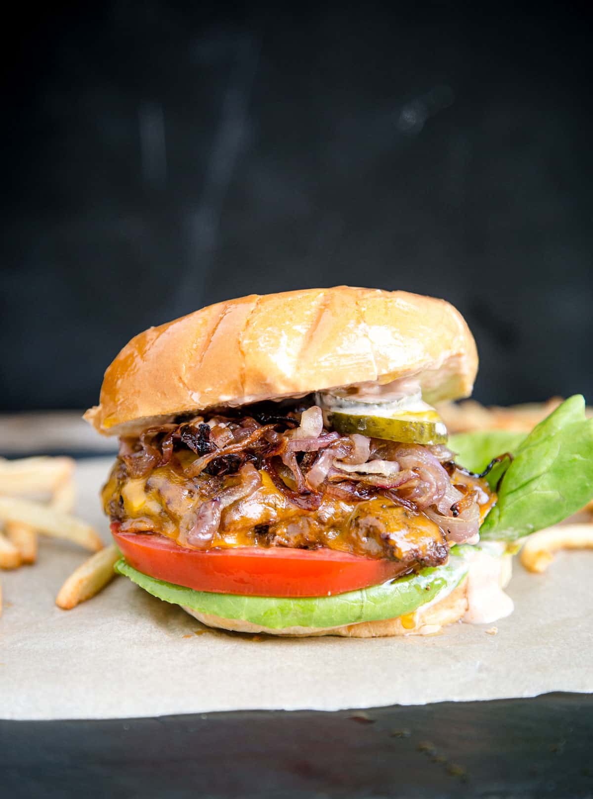 https://www.vindulge.com/wp-content/uploads/2020/06/Smash-Burgers-with-Caramelized-Onions.jpg
