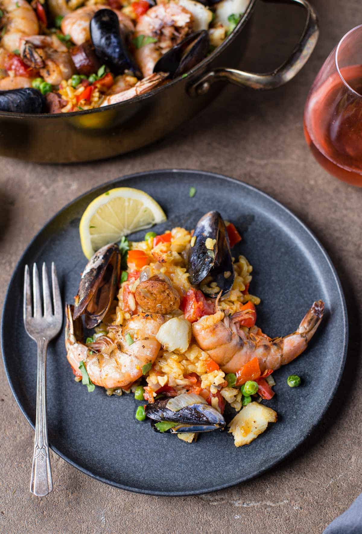 https://www.vindulge.com/wp-content/uploads/2021/02/A-plate-of-Seafood-Paella.jpg