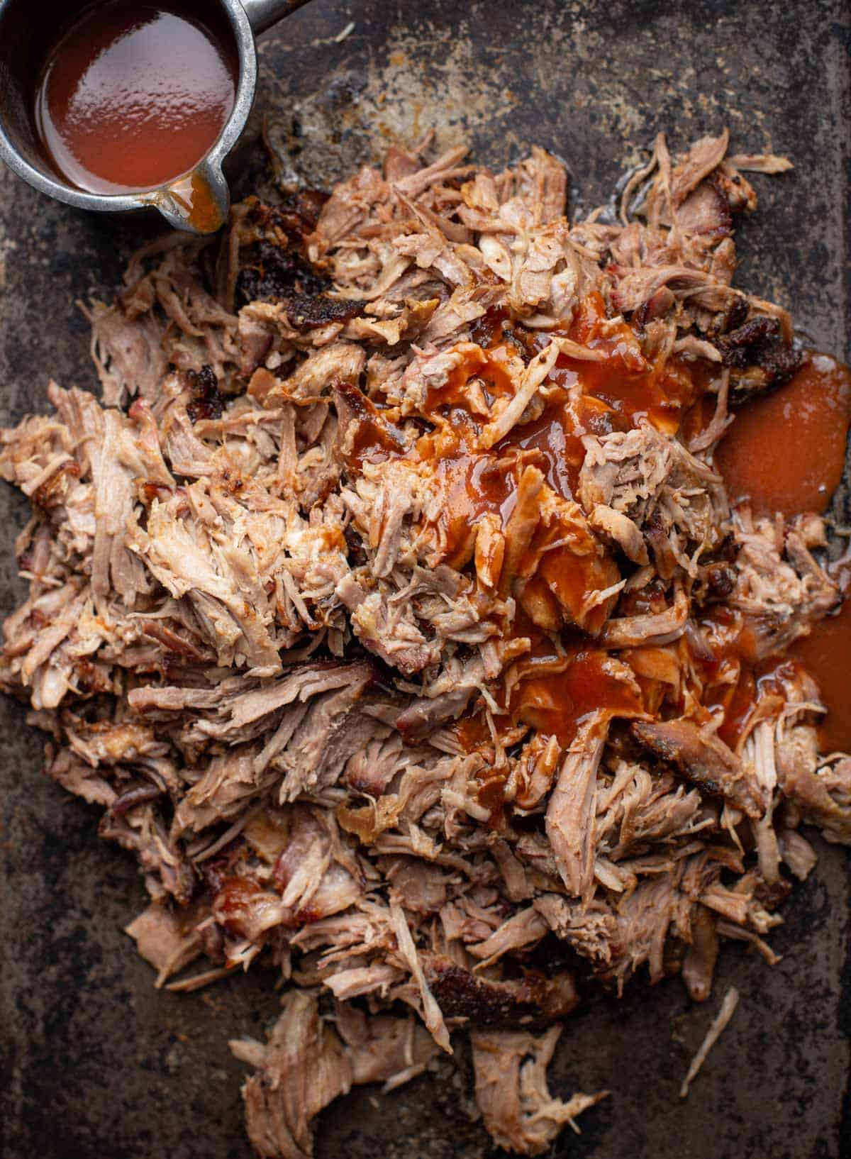 Smoked pulled pork on a sheetpan