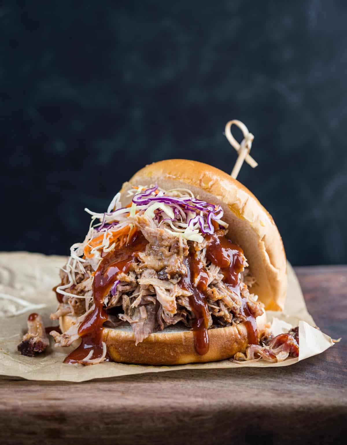 https://www.vindulge.com/wp-content/uploads/2021/09/Pulled-Pork-Sandwich-with-easy-smoked-pulled-pork.jpg