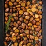 Roasted potatoes on a sheet pan.