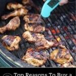 A digital thermometer being used on chicken on a grill.