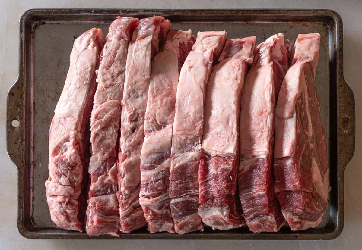 Slices of steak from a ribeye roll.