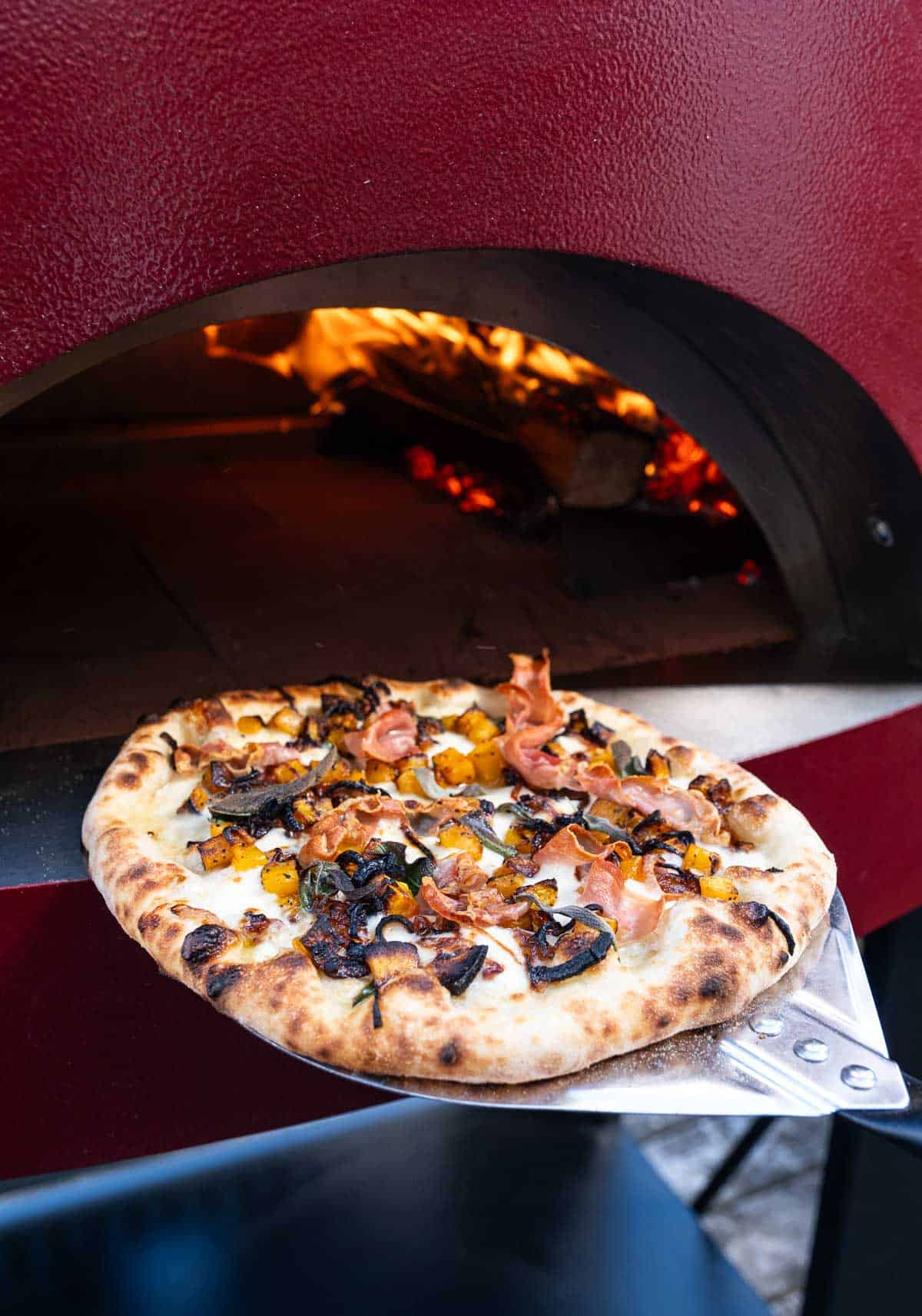 Butternut Squash, Caramelized Onion, and Prosciutto Pizza after being cooked in an Alfa Forni pizza oven