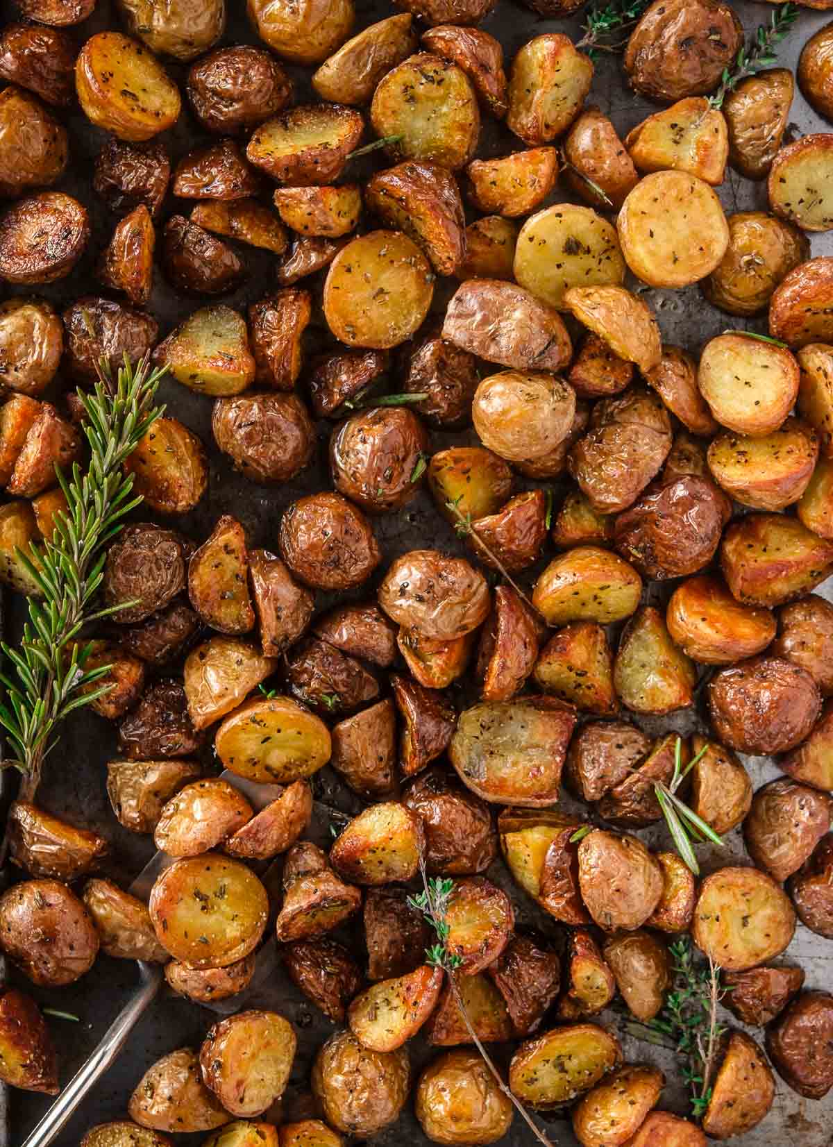 Roasted potatoes on a sheet pan.