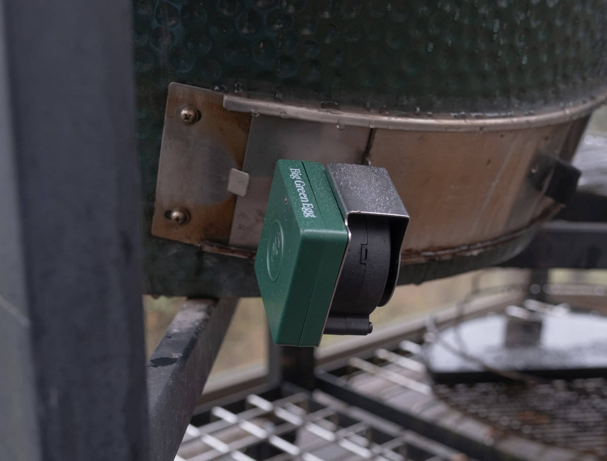 The egg genius sitting in the mounting plate in the bottom vent of an XL Big Green Egg.