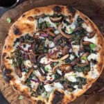 Kale and Wild Mushroom Pizza on a serving platter.